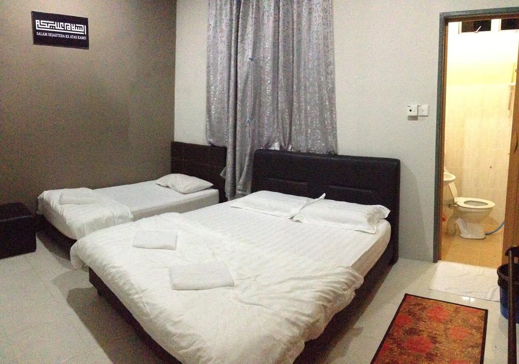 Anggun Beach Guest House Paka Номер фото