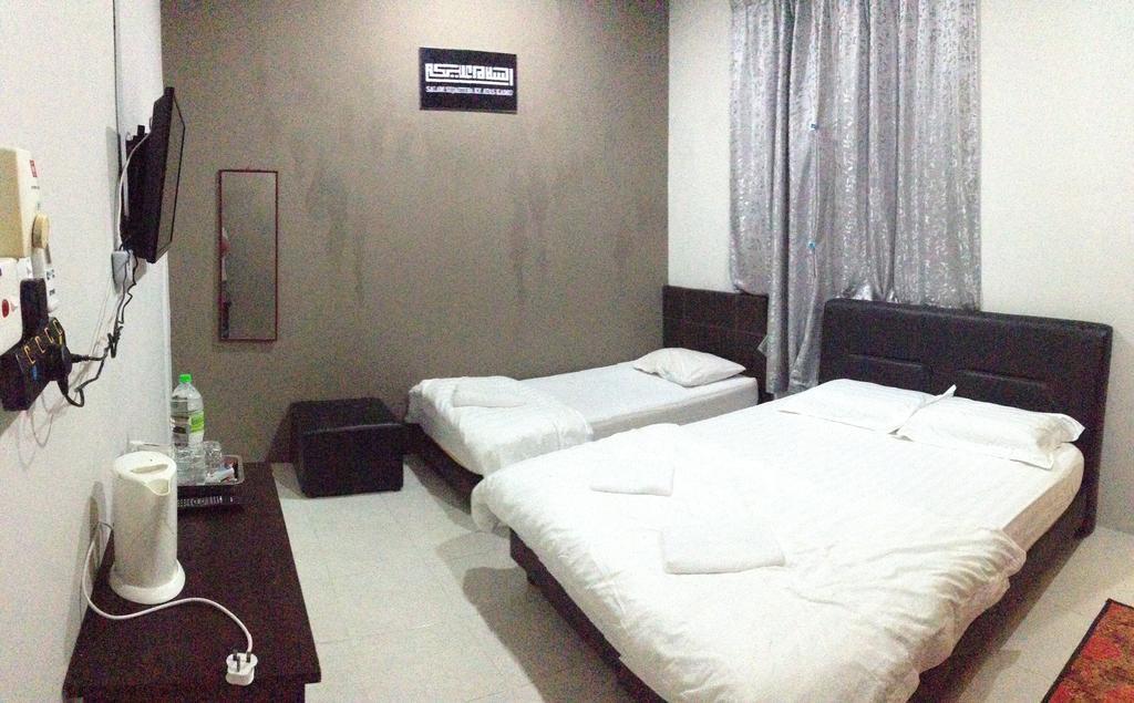 Anggun Beach Guest House Paka Номер фото