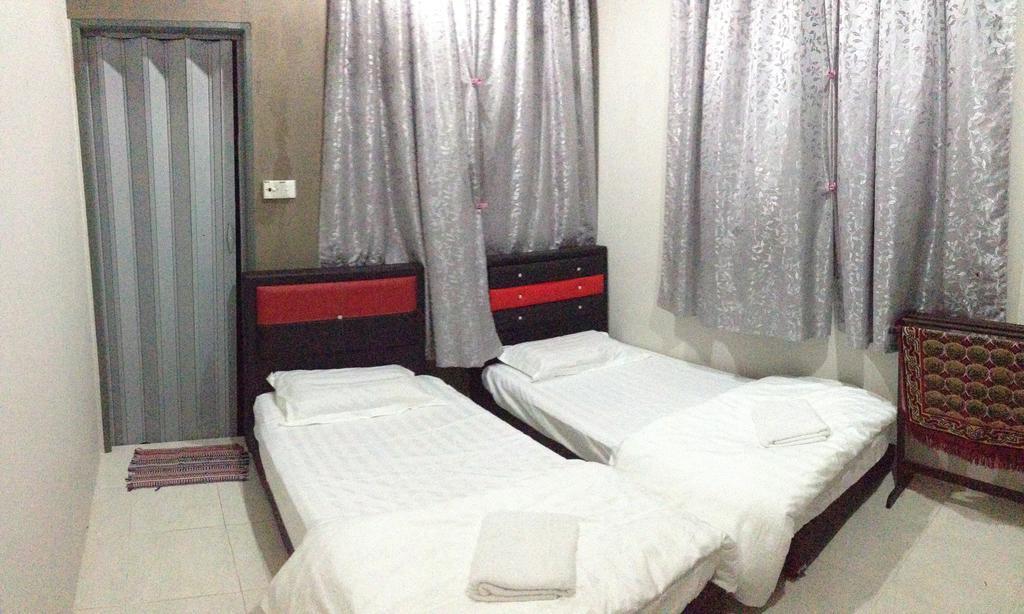 Anggun Beach Guest House Paka Номер фото