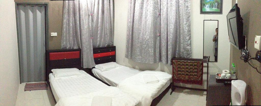 Anggun Beach Guest House Paka Номер фото