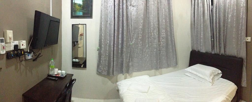 Anggun Beach Guest House Paka Номер фото