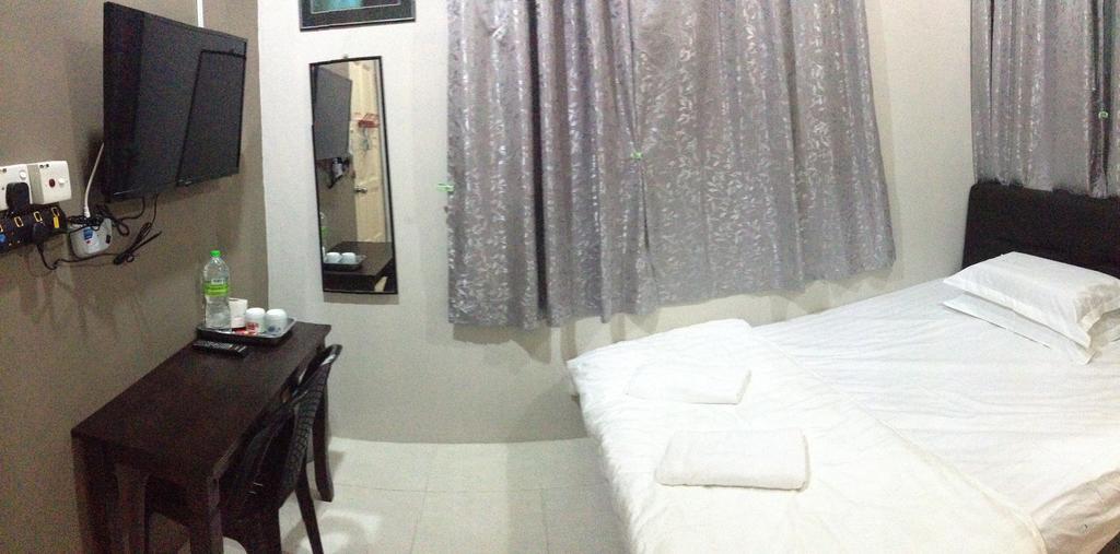 Anggun Beach Guest House Paka Номер фото
