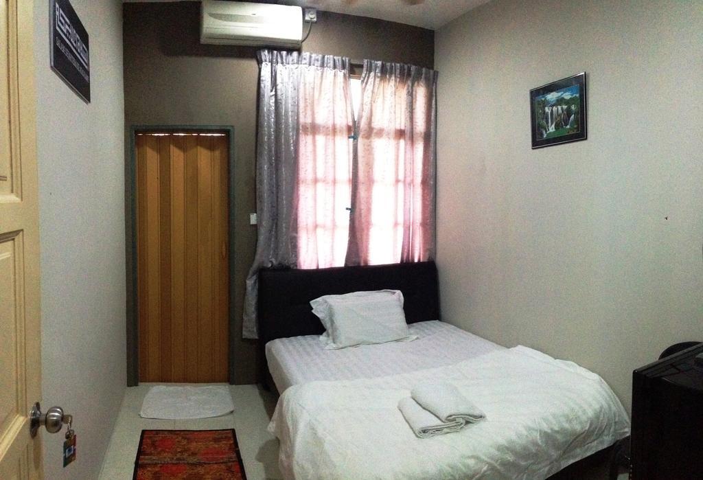 Anggun Beach Guest House Paka Номер фото
