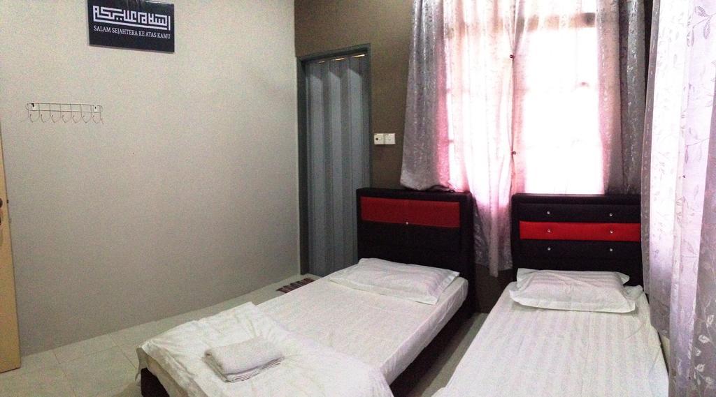 Anggun Beach Guest House Paka Номер фото