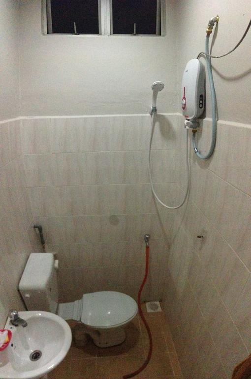 Anggun Beach Guest House Paka Номер фото